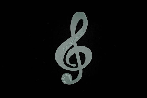 AN ACRYLIC TREBLE CLEF SEWING CRAFT TEMPLATE