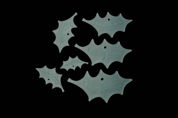 A SET OF 6 HOLLY LEAF ACRYLIC CRAFT SEWING TEMPLATES