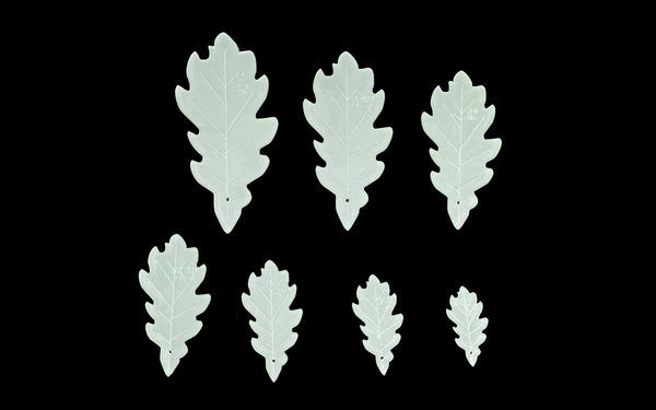 A SET OF 7 ACRYLIC LEAF/TREE SEWING/CRAFT TEMPLATES