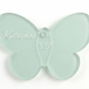 A close up of a butterfly acrylic sewing and craft template 