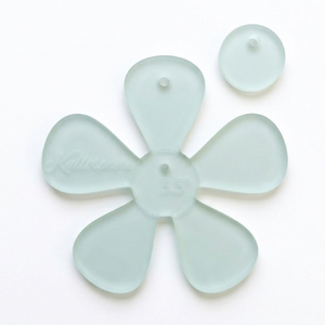 Close up of an acrylic flower sewing and craft template 