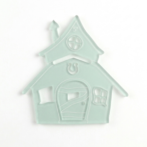 Precision-cut whimsical house acrylic template with separate window and door pieces for sewing, appliqué, and mindful drawing.