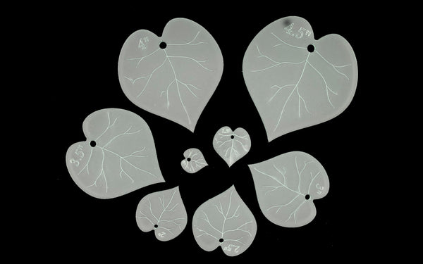 A SET OF 8 HEART SHAPED LEAF ACRYLIC SEWING QUILTING CRAFT TEMPLATES