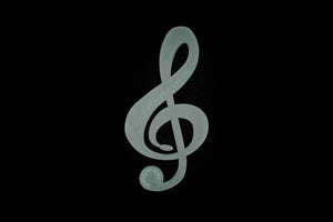 AN ACRYLIC TREBLE CLEF SEWING CRAFT TEMPLATE