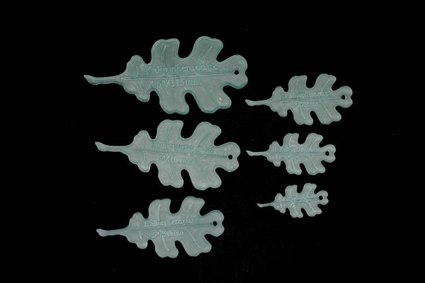 A SET OF 6 ACRYLIC OAK LEAF SEWING/CRAFT TEMPLATES