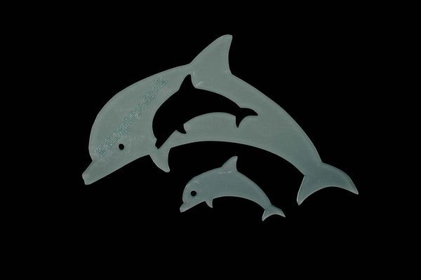 A SET OF DOLPHIN ACRYLIC SEWING/CRAFT TEMPLATE