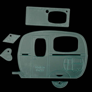 Caravan-shaped acrylic sewing template for patchwork, quilting, and fabric appliqué, featuring a classic retro camper design.